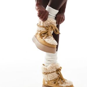 ASOS DESIGN Alpine shearling lace up snow boots